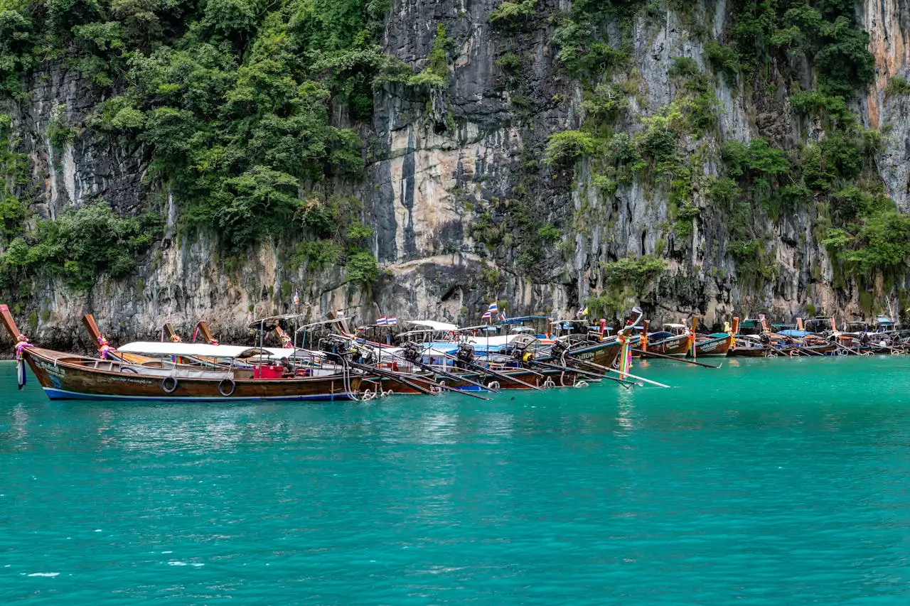 Limestone islands and clear shallow water off the Phuket coast